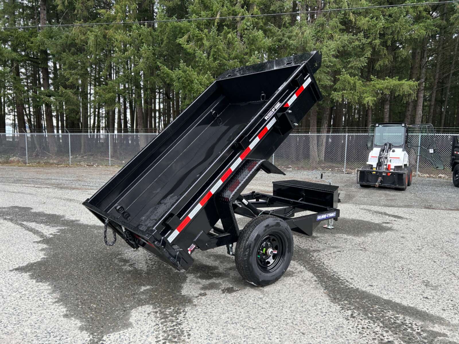 Photo of 2025 Sure-Trac 5X8 5,000LB GVWR Dump Trailer