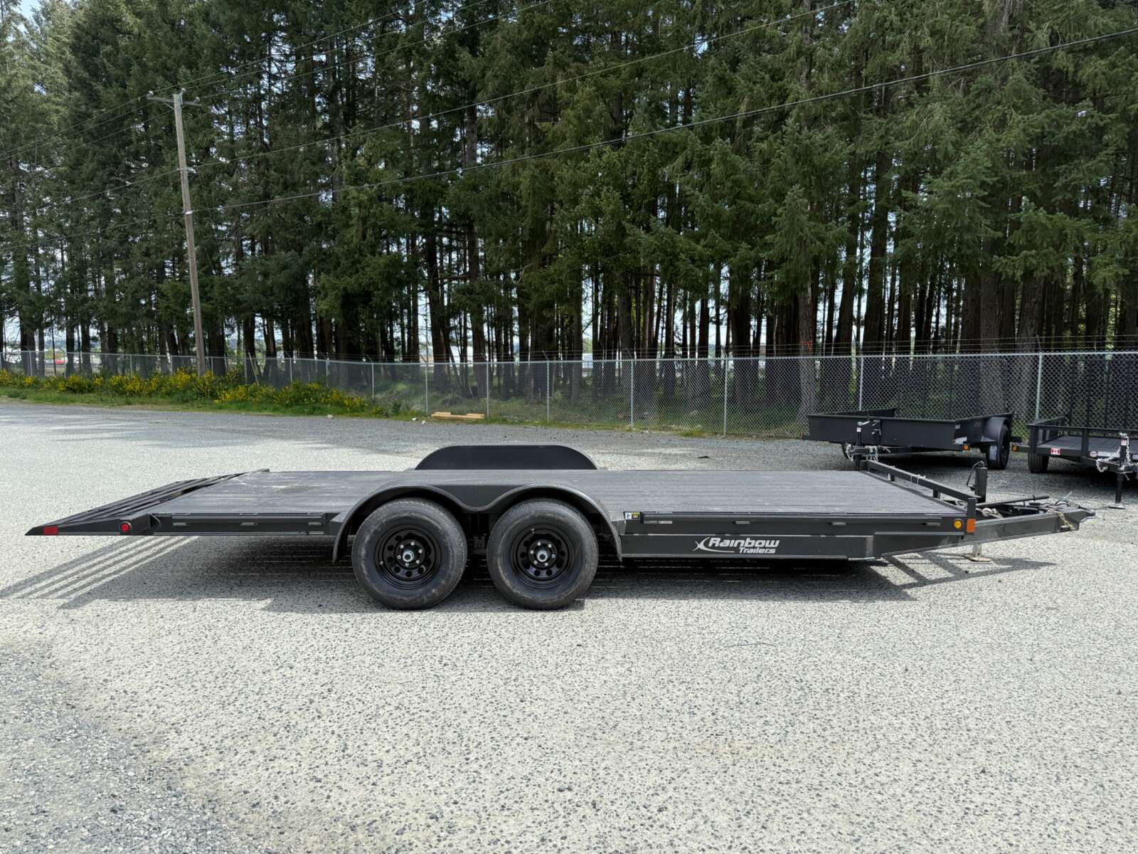 Photo of 2025 Rainbow Trailers 7X20' Equipment / Car Hauler Tilt Trailer - 9900LB GVWR