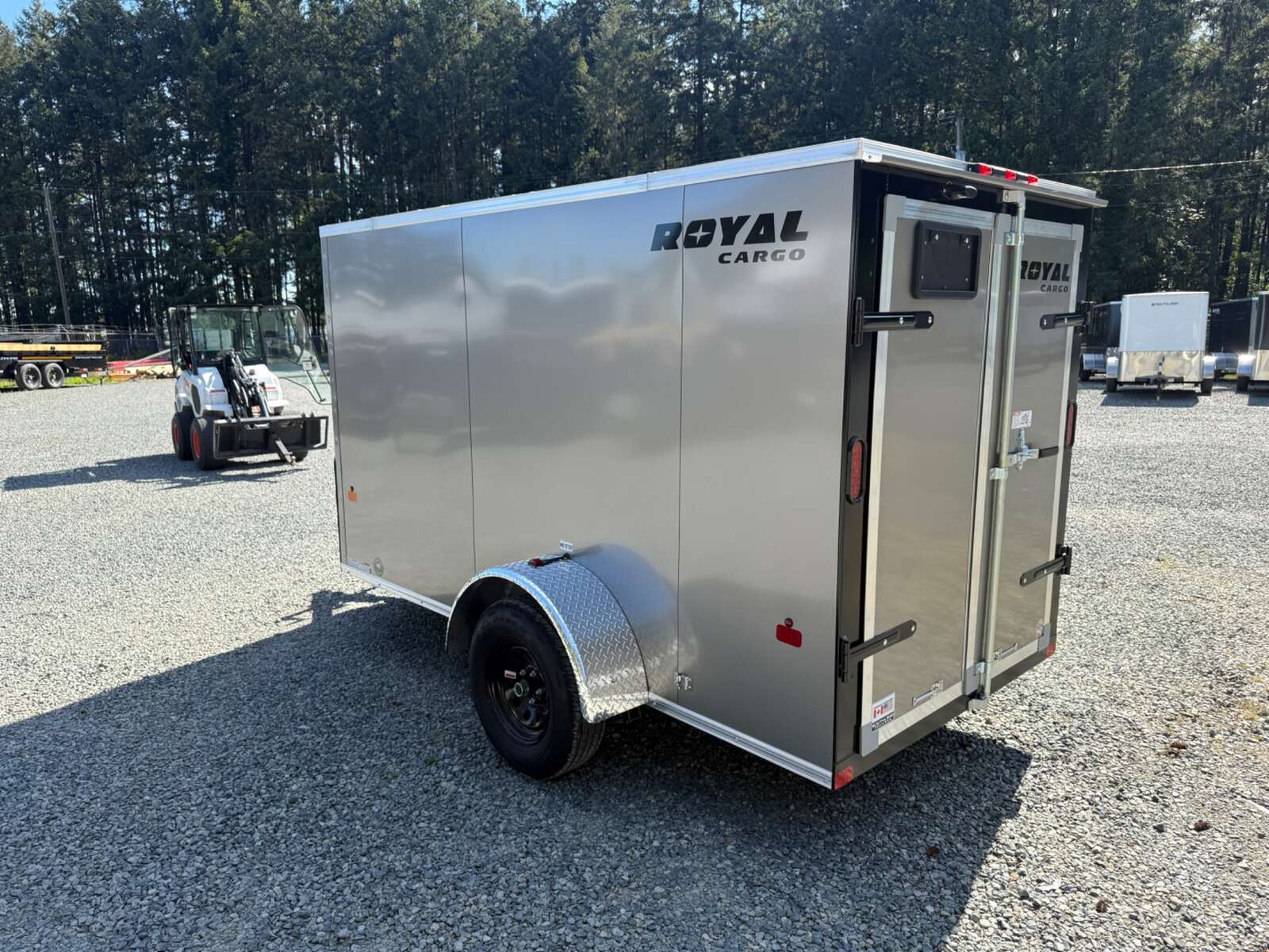 Photo of 2026 Royal Cargo 5X10+V 2990LB GVW BARN DOORS 64" INTERIOR