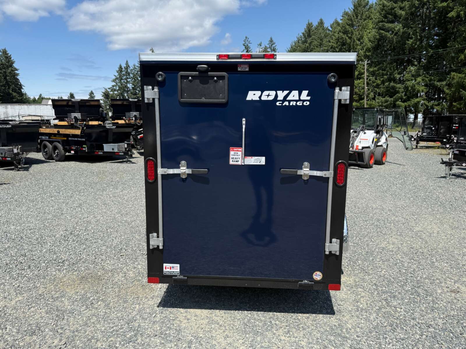 Photo of 2026 Royal Cargo 5X10+V 2990LB GVW - RAMP DOOR - 64" INTERIOR - SIDE DOOR