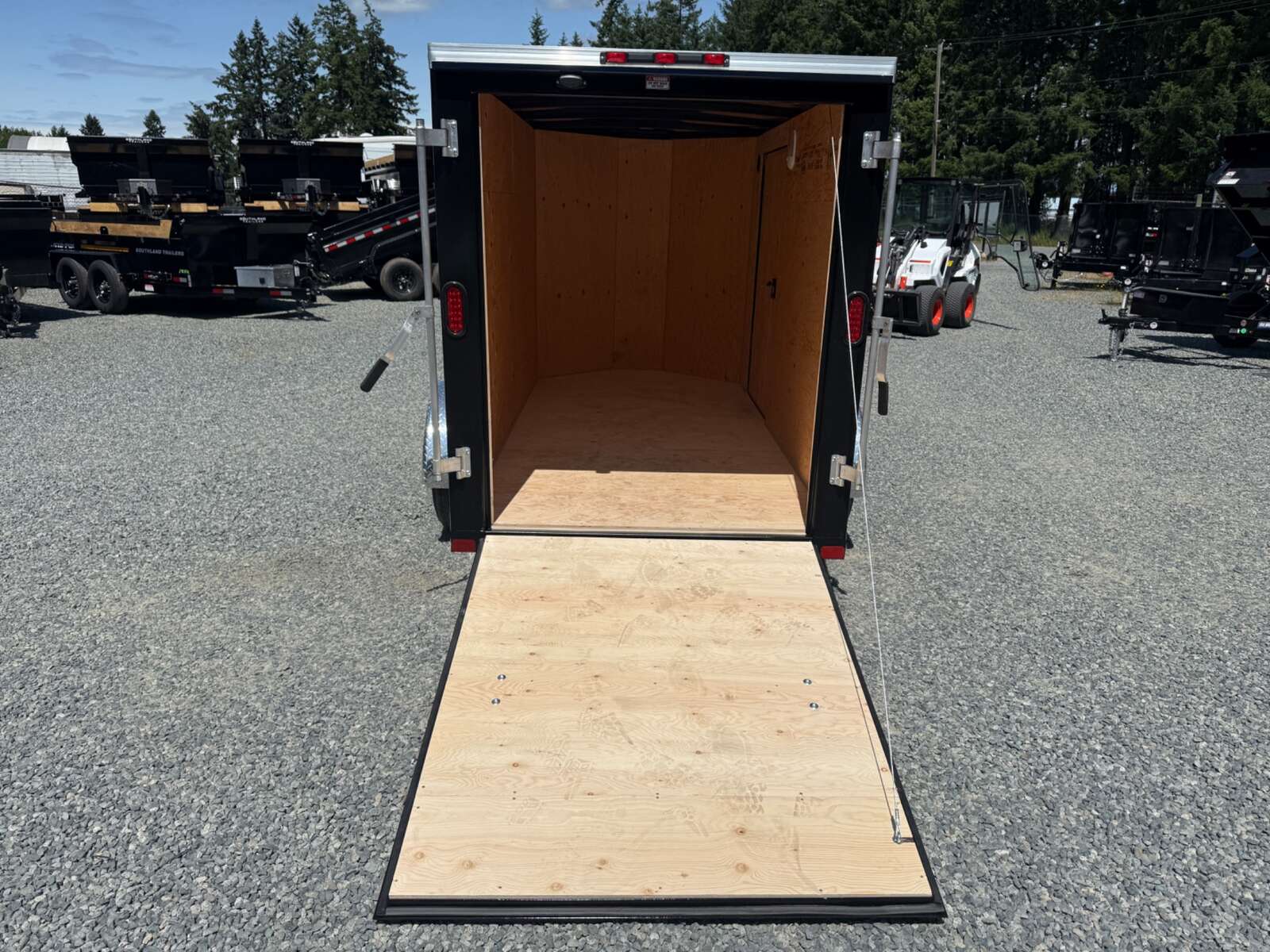 Photo of 2026 Royal Cargo 5X10+V 2990LB GVW - RAMP DOOR - 64" INTERIOR - SIDE DOOR