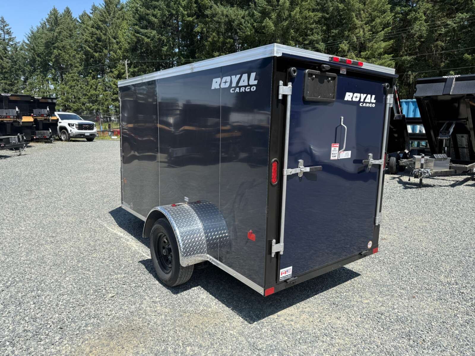 Photo of 2026 Royal Cargo 5X10+V 2990LB GVW - RAMP DOOR - 64" INTERIOR - SIDE DOOR