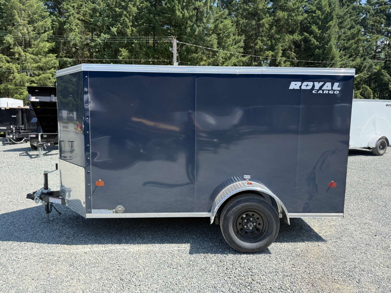 Photo of 2026 Royal Cargo 5X10+V 2990LB GVW - RAMP DOOR - 64" INTERIOR - SIDE DOOR