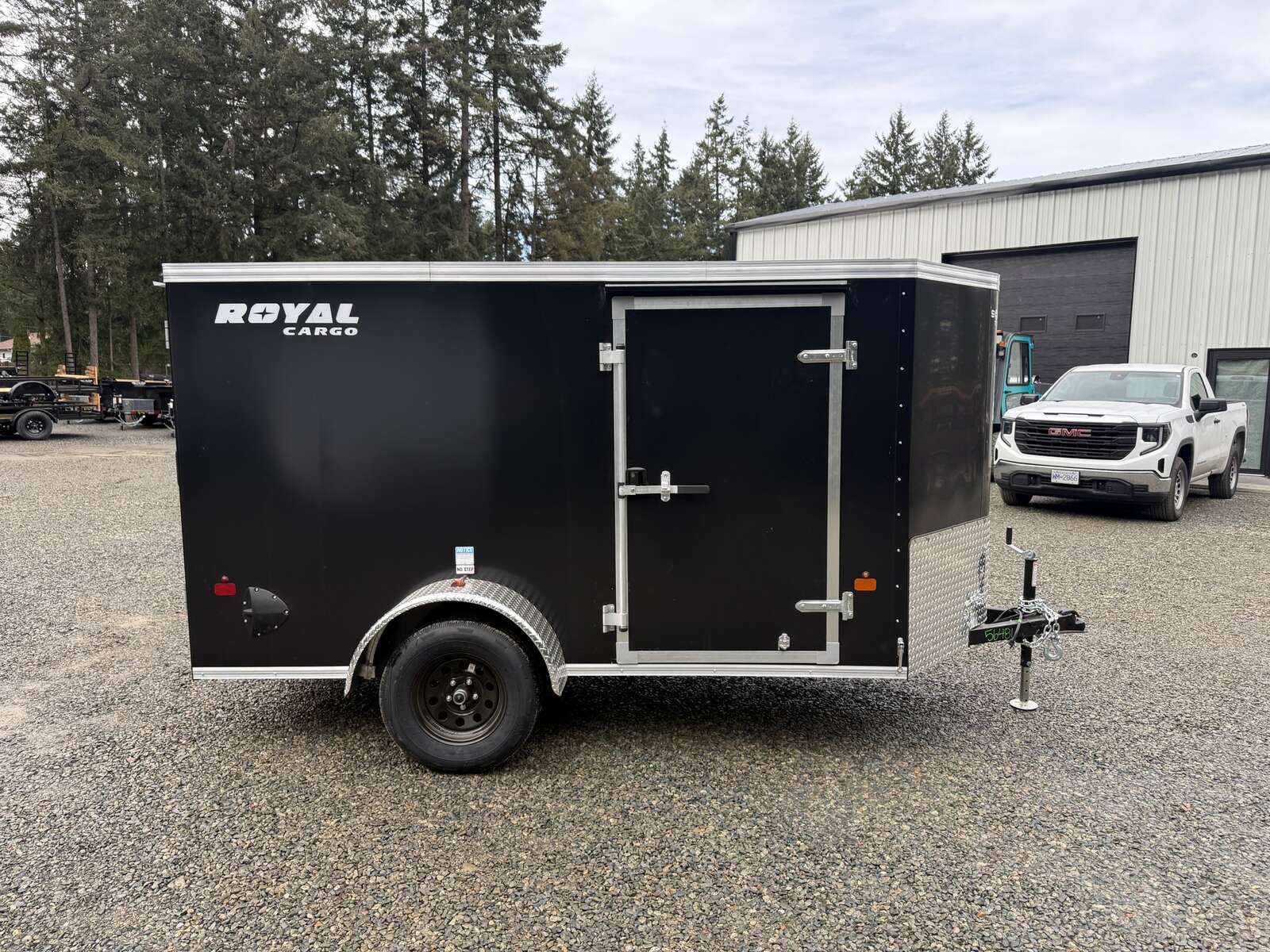 Photo of 2026 5X10 +V-NOSE 2,990LB GVW CARGO TRAILER - SIDE DOOR - REAR RAMP DOOR 