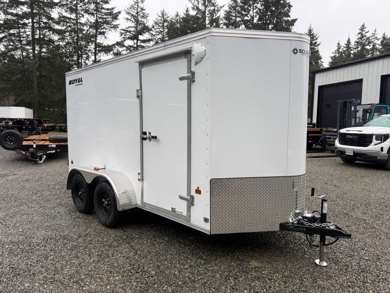 Photo of Used 2025 6X12 +V-Nose 7,700LB GVW Cargo Trailer - Barn Doors 