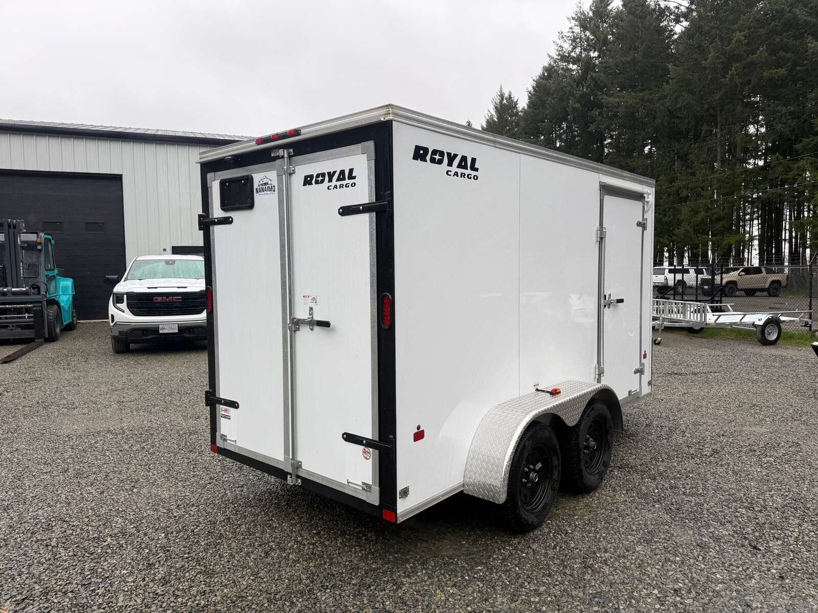 Photo of Used 2025 6X12 +V-Nose 7,700LB GVW Cargo Trailer - Barn Doors 