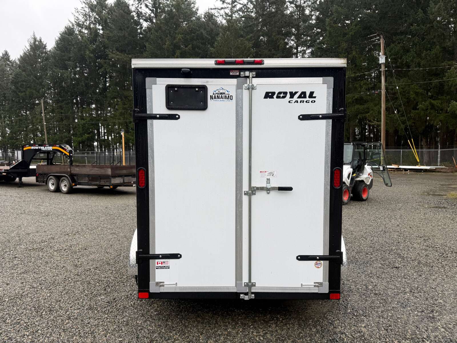 Photo of Used 2025 6X12 +V-Nose 7,700LB GVW Cargo Trailer - Barn Doors 