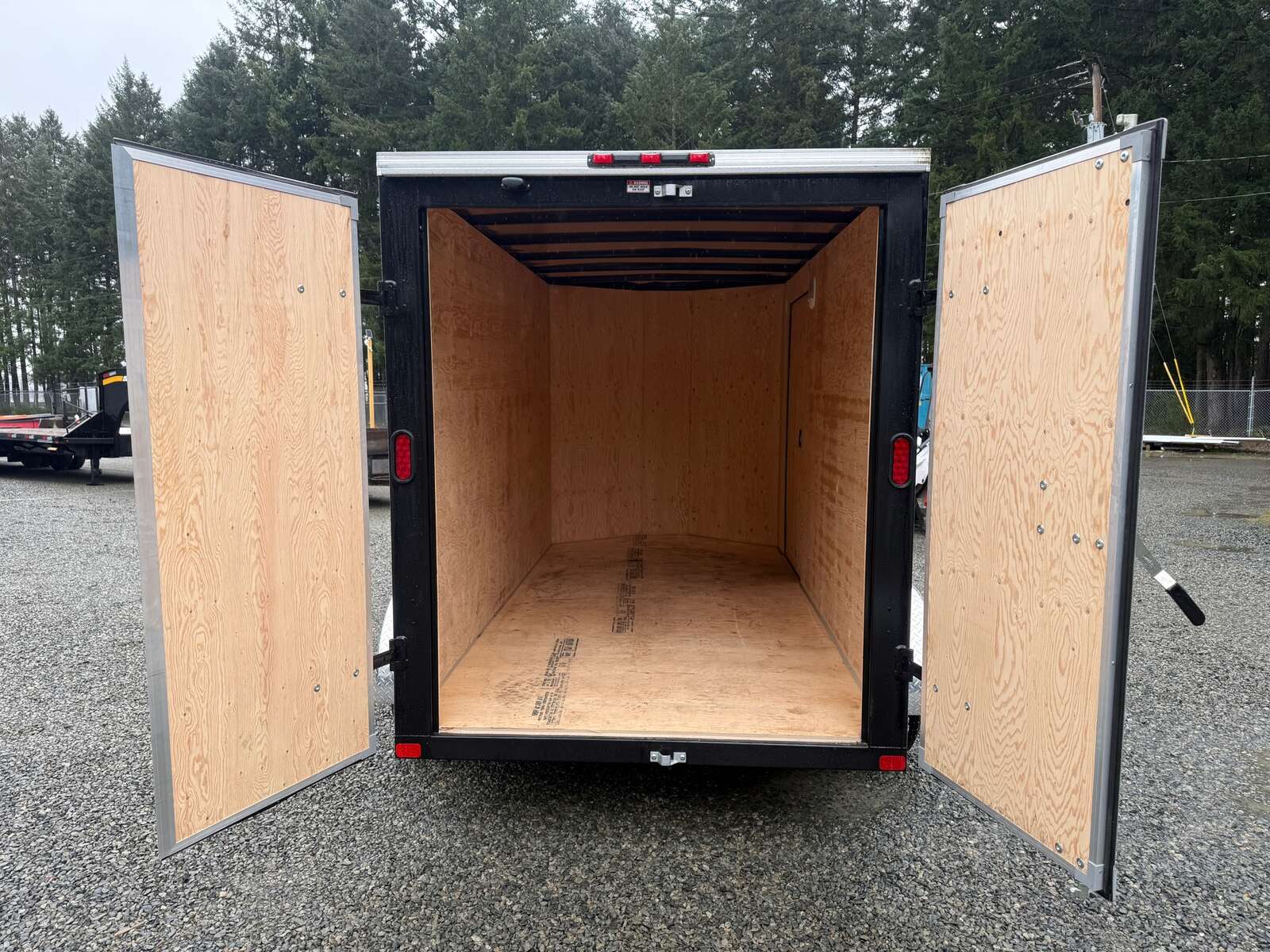 Photo of Used 2025 6X12 +V-Nose 7,700LB GVW Cargo Trailer - Barn Doors 