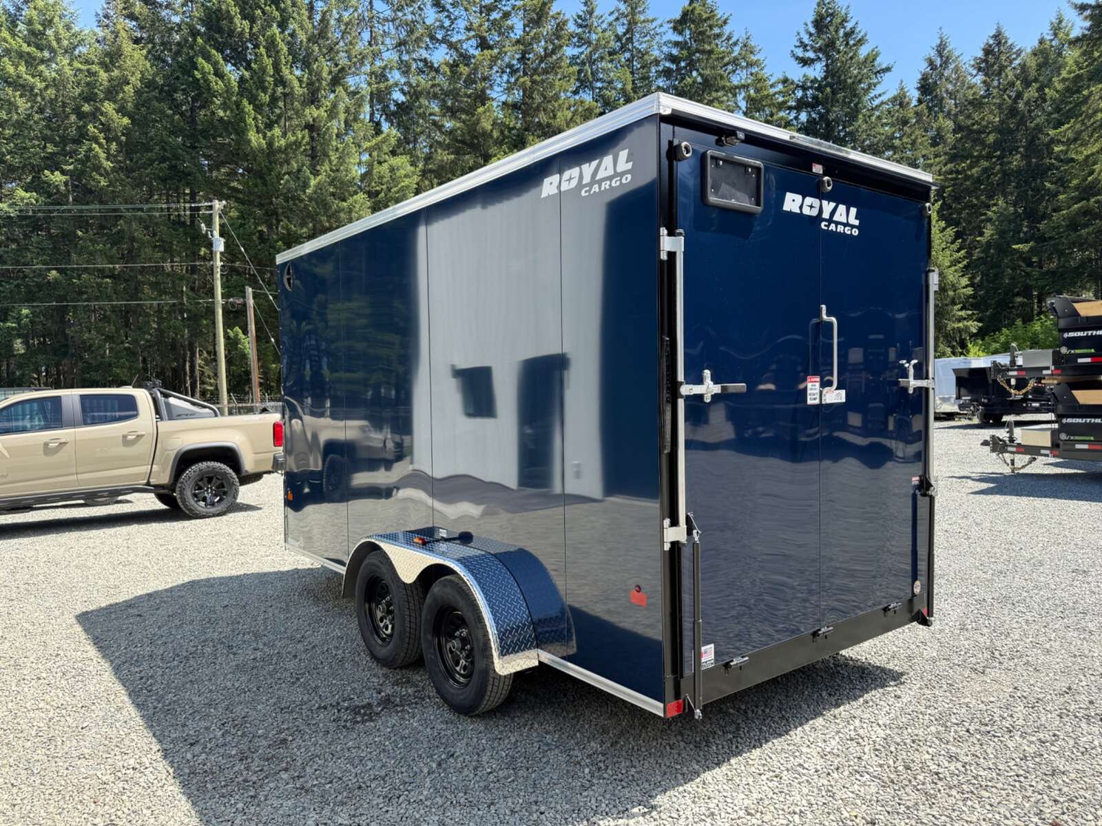Photo of 2026 ROYAL CARGO 7X14+V 7700LB - 86" INTERIOR - RAMP DOOR 