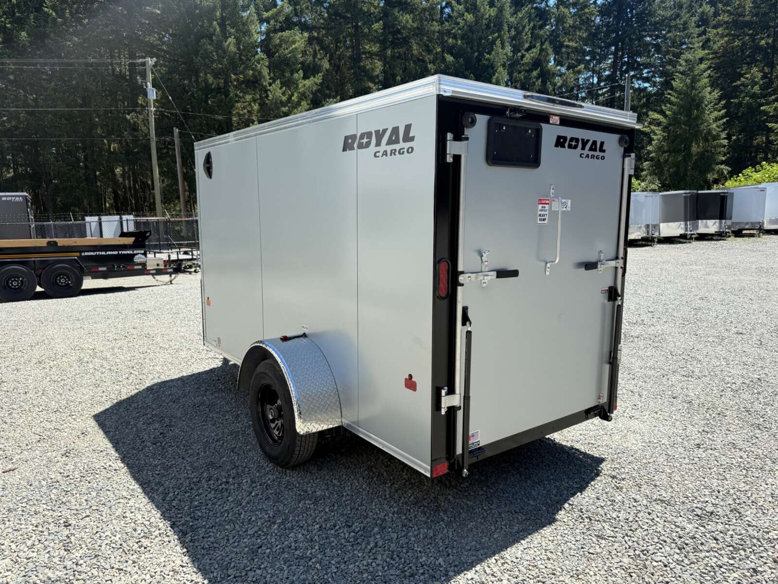 Photo of 2026 Royal Cargo 5X10+V 2990LB GVW - RAMP DOOR - 64" INTERIOR 