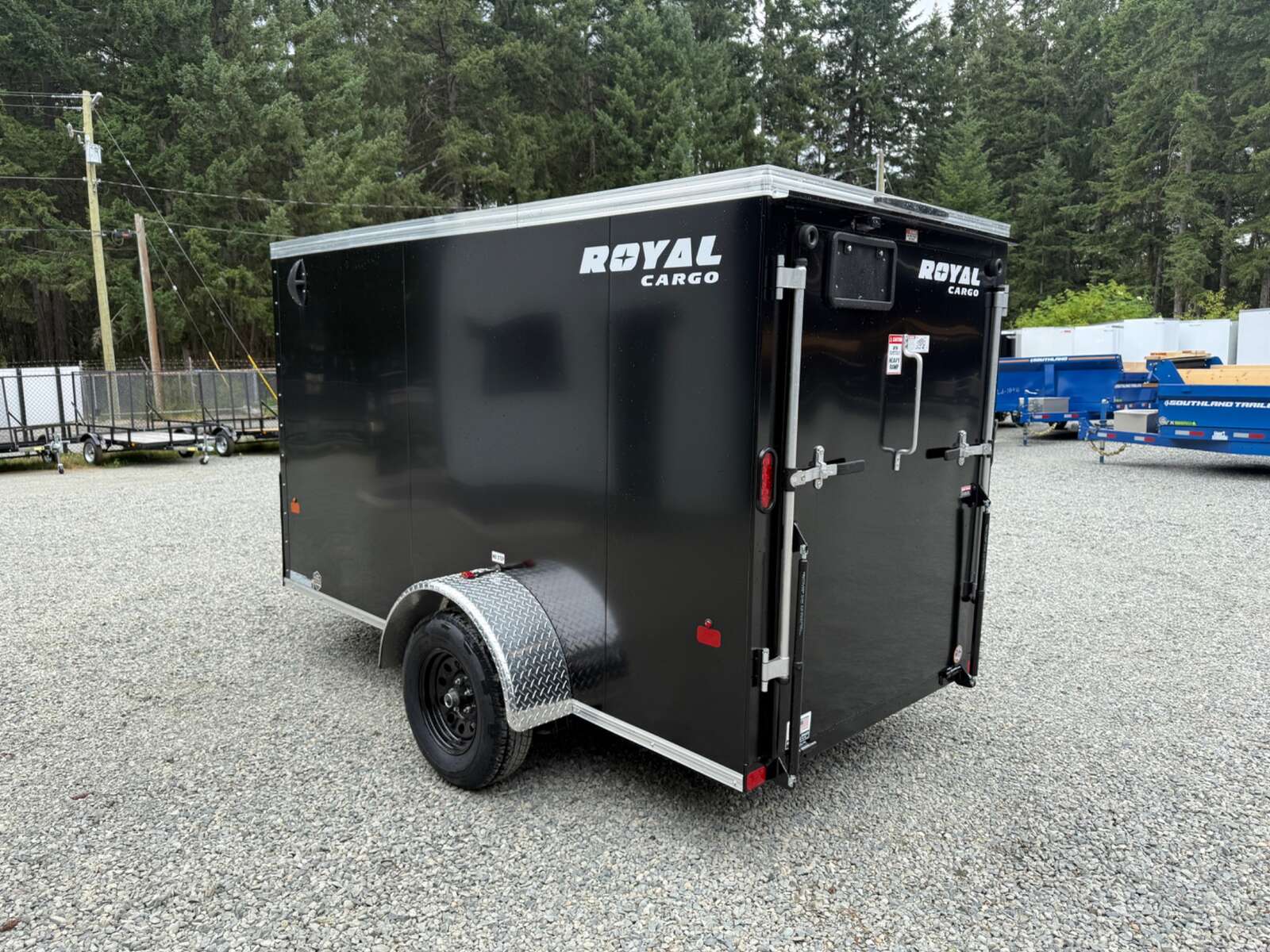 Photo of 2026 Royal Cargo 5X10+V 2990LB GVW - RAMP DOOR - 64" INTERIOR 