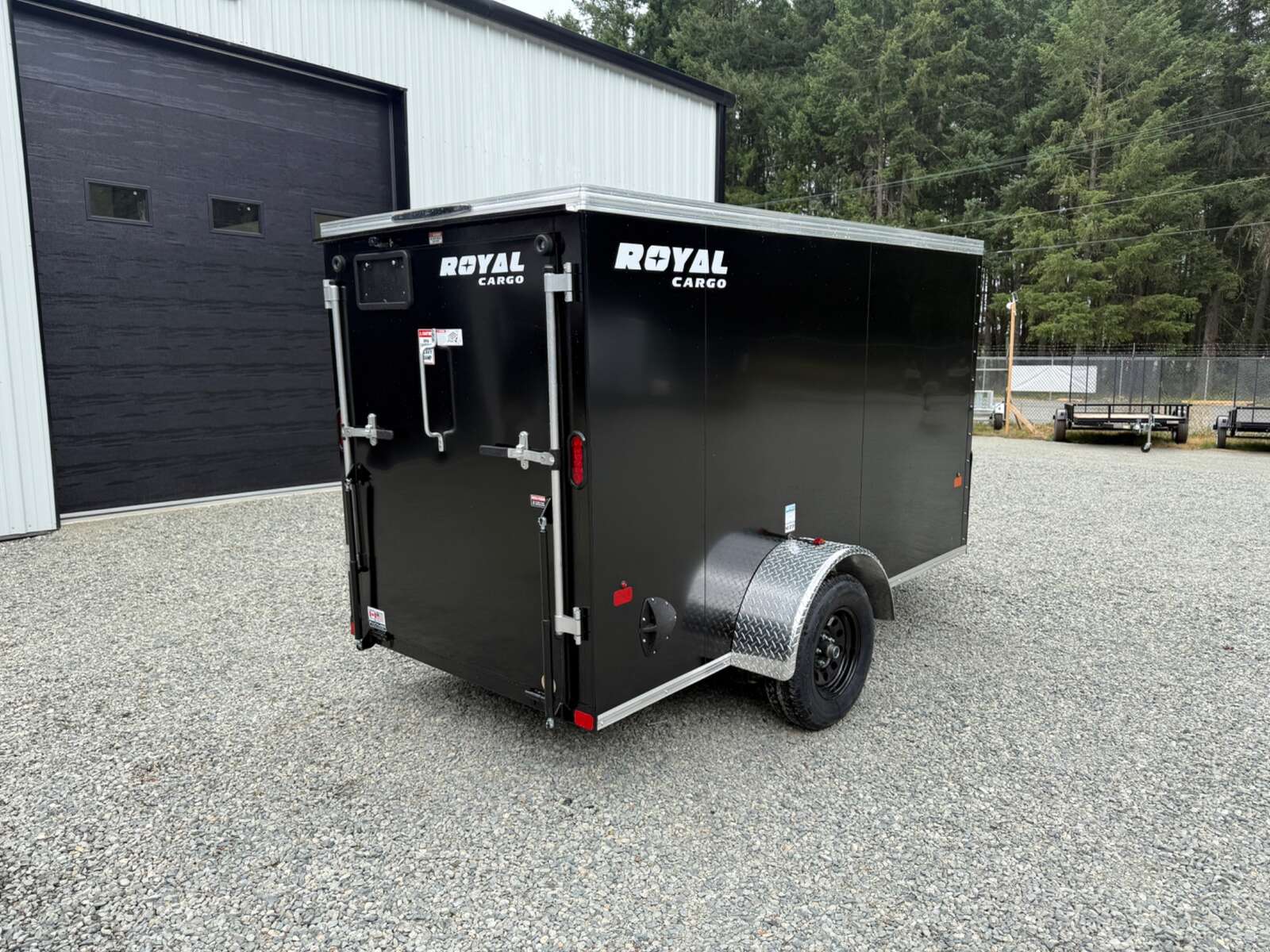Photo of 2026 Royal Cargo 5X10+V 2990LB GVW - RAMP DOOR - 64" INTERIOR 