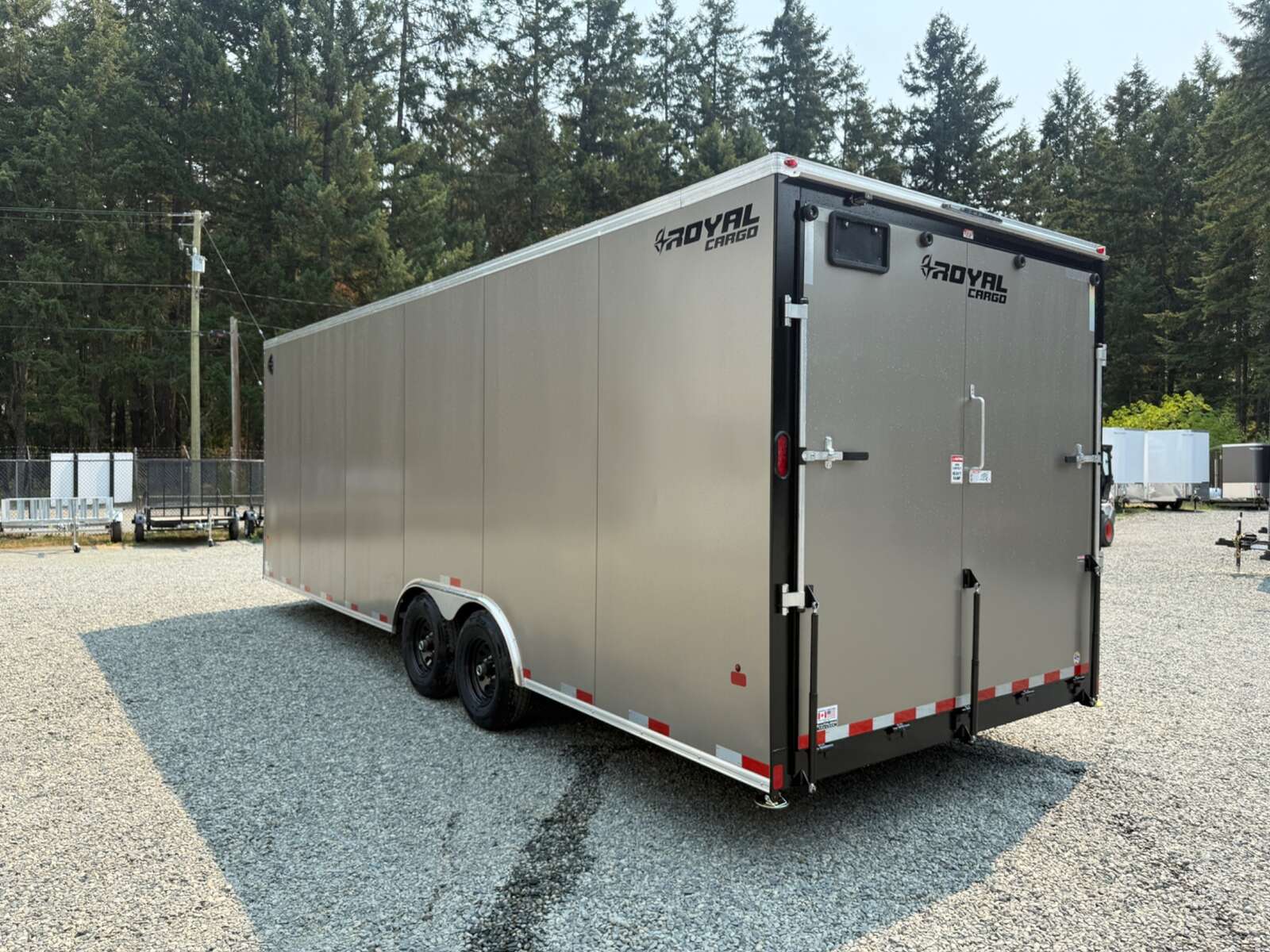 Photo of 2027 ROYAL 8.5X24 +V-NOSE 11,400LB GVW CARGO TRAILER - 86" INTERIOR - RAMP DOOR 
