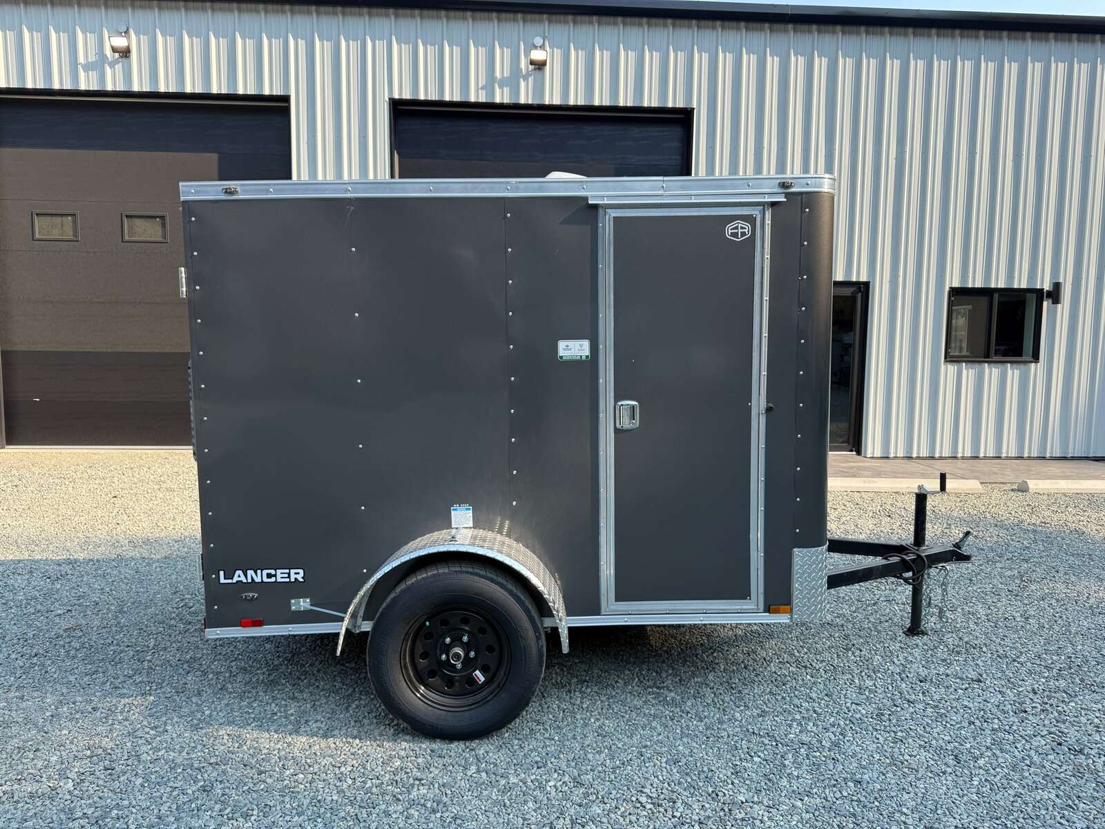 Photo of 2027 CARGO KING 5X8 2,990LB GVW - 65" INTERIOR - BARN DOOR