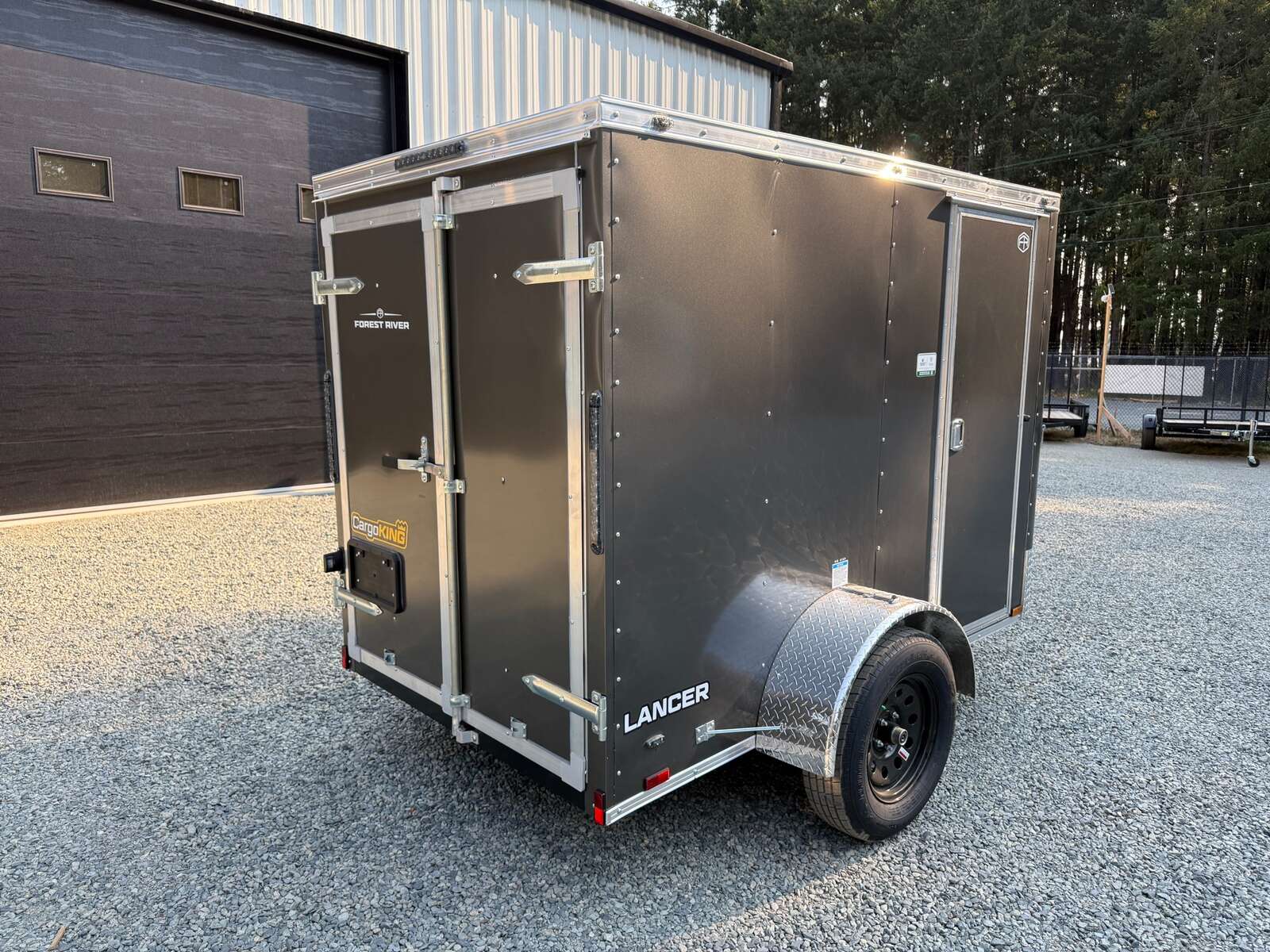 Photo of 2027 CARGO KING 5X8 2,990LB GVW - 65" INTERIOR - BARN DOOR