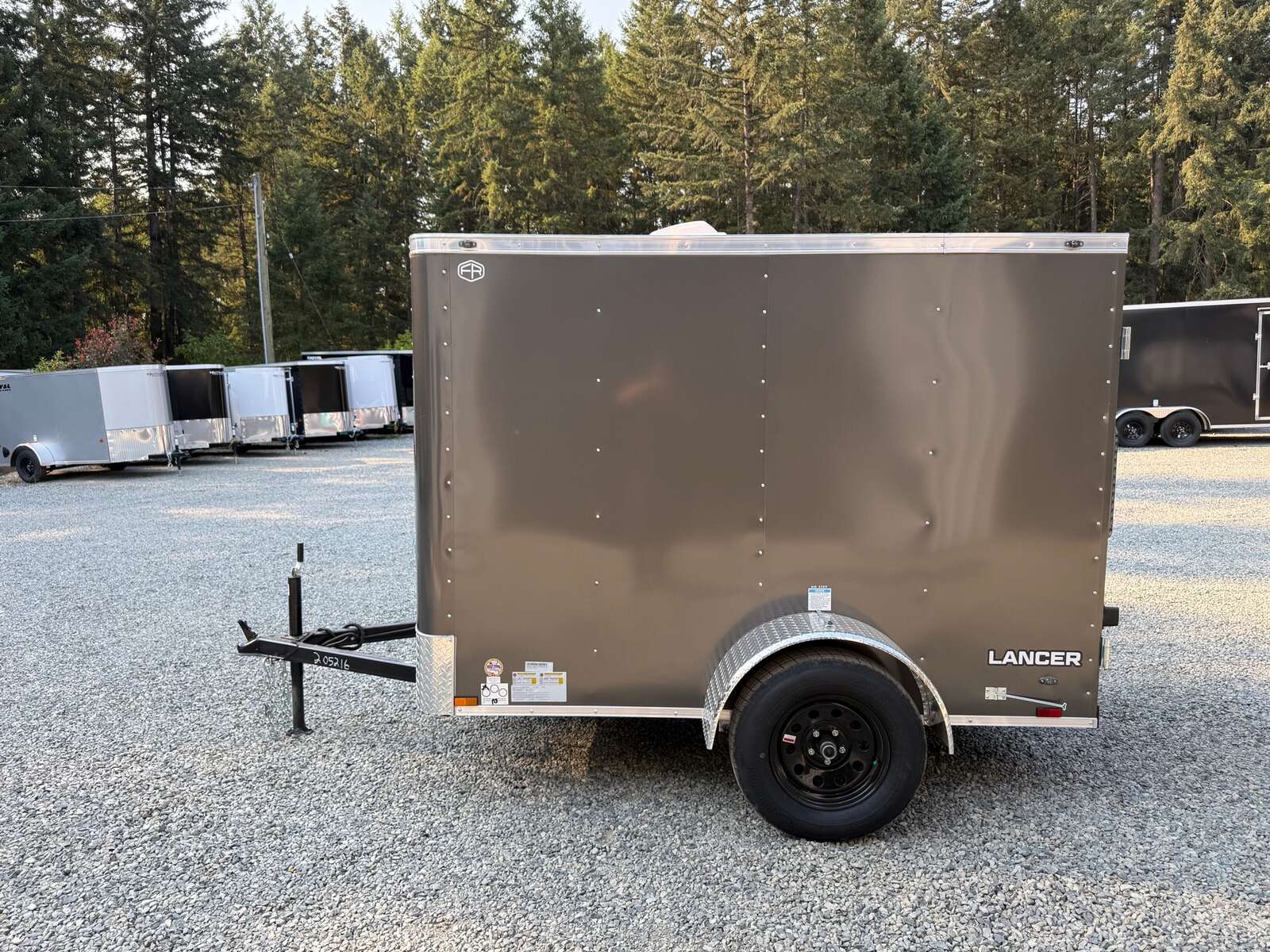Photo of 2027 CARGO KING 5X8 2,990LB GVW - 65" INTERIOR - BARN DOOR