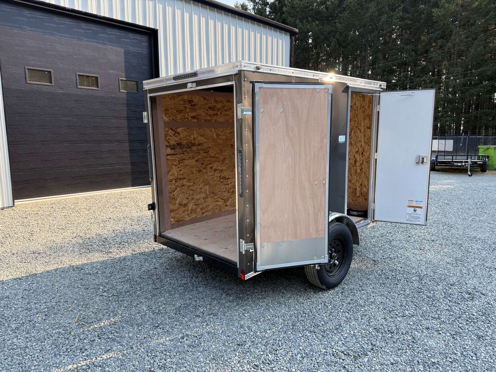 Photo of 2027 CARGO KING 5X8 2,990LB GVW - 65" INTERIOR - BARN DOOR