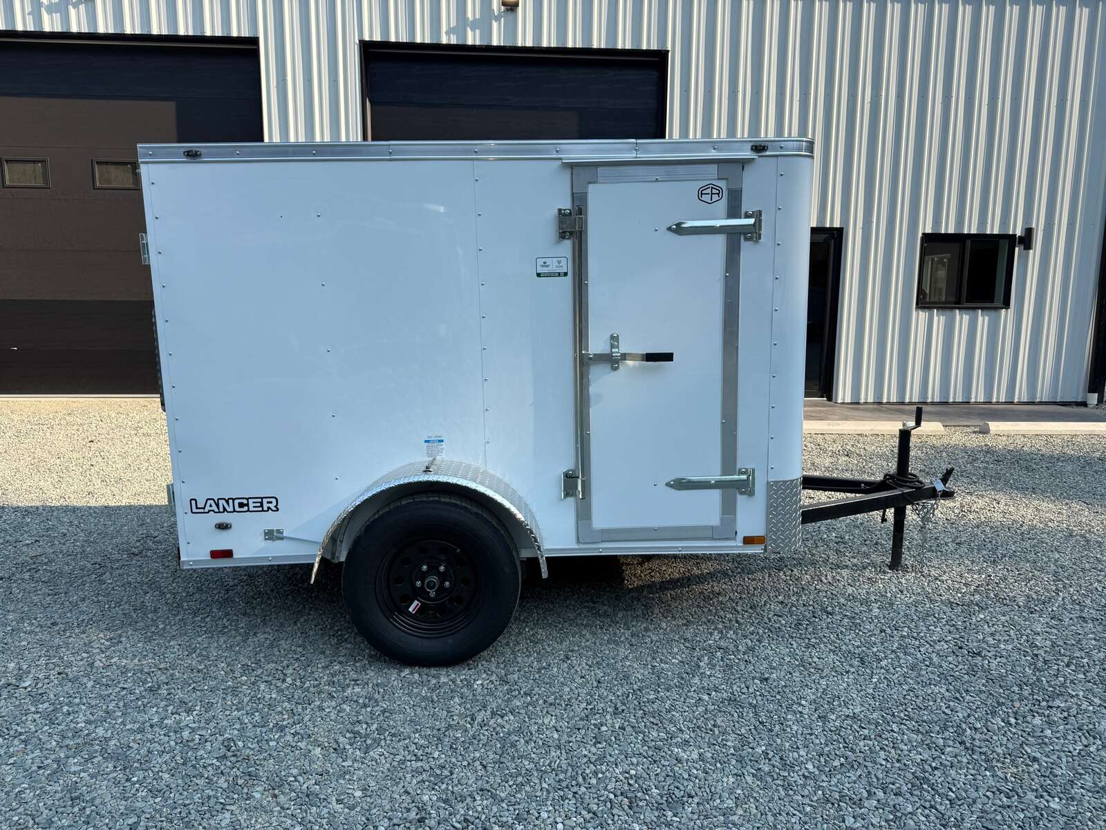 Photo of 2027 CARGO KING 5X8 2,990LB GVW - 59" INTERIOR - BARN DOOR