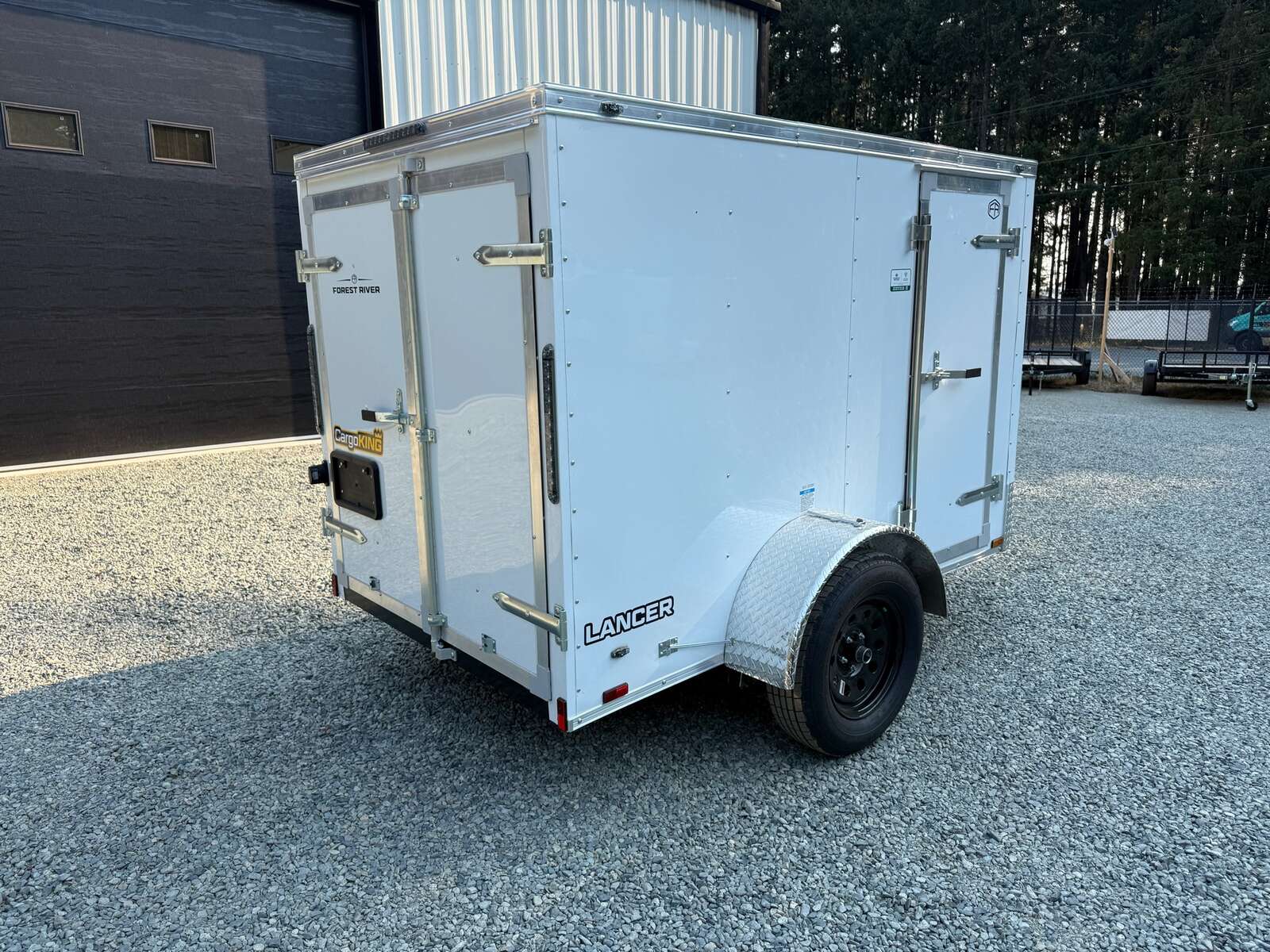 Photo of 2027 CARGO KING 5X8 2,990LB GVW - 59" INTERIOR - BARN DOOR