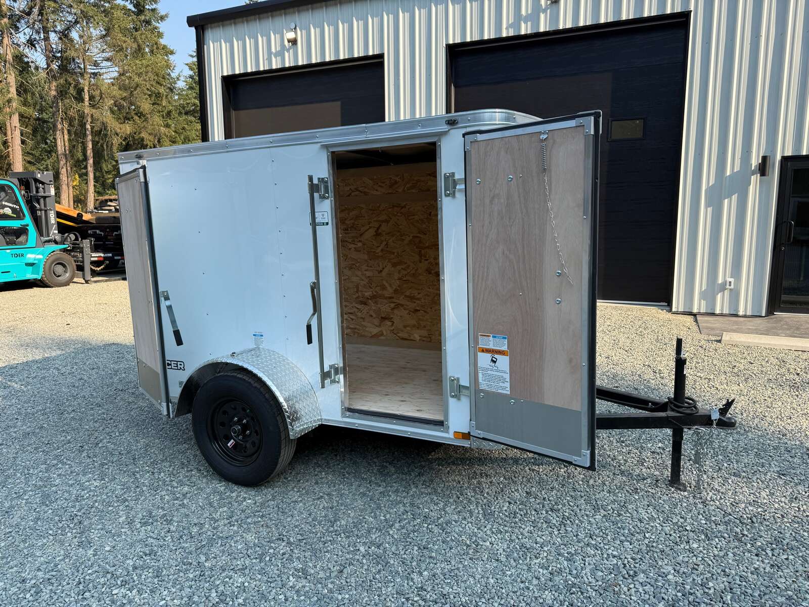 Photo of 2027 CARGO KING 5X8 2,990LB GVW - 59" INTERIOR - BARN DOOR