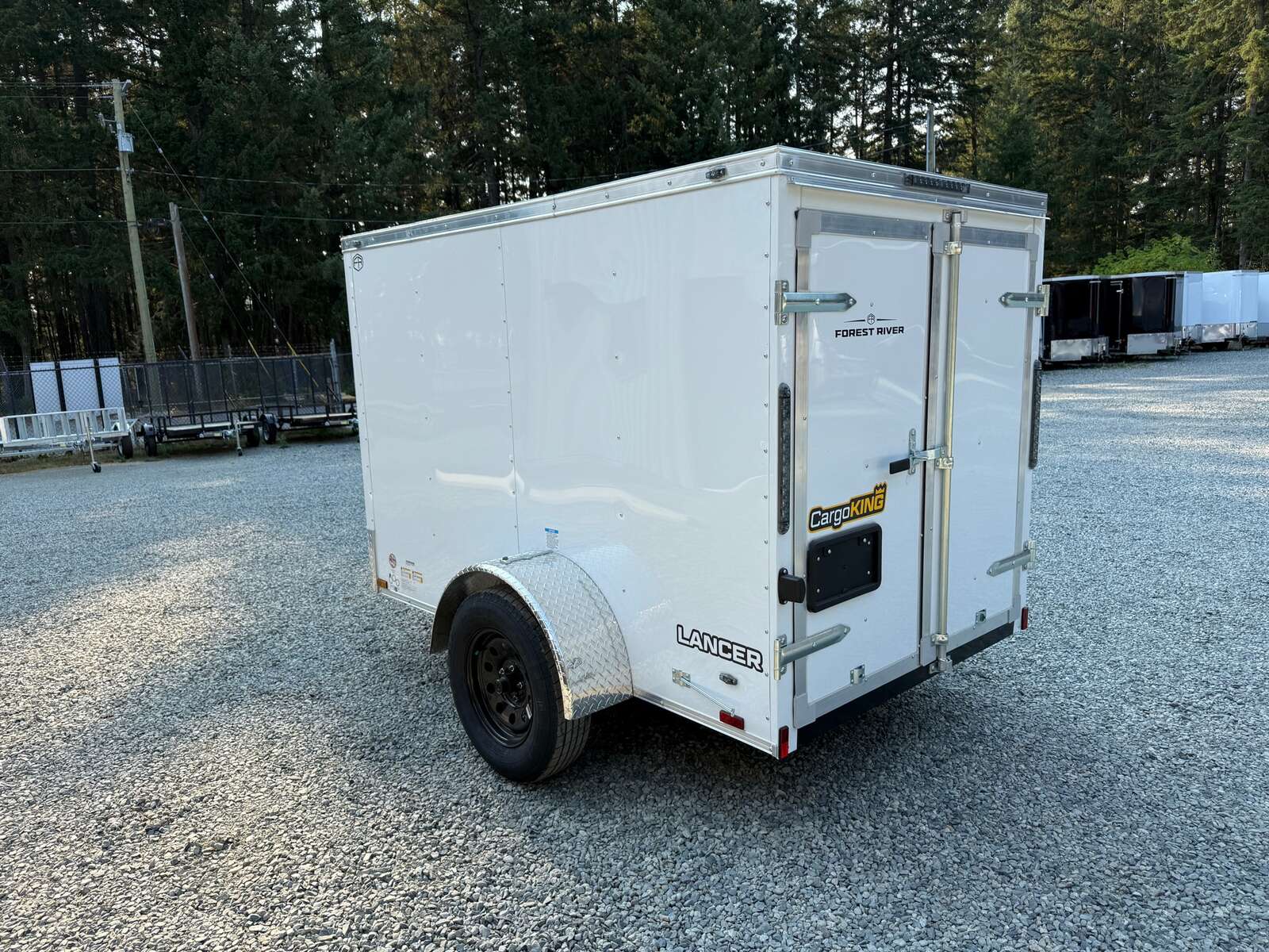 Photo of 2027 CARGO KING 5X8 2,990LB GVW - 59" INTERIOR - BARN DOOR