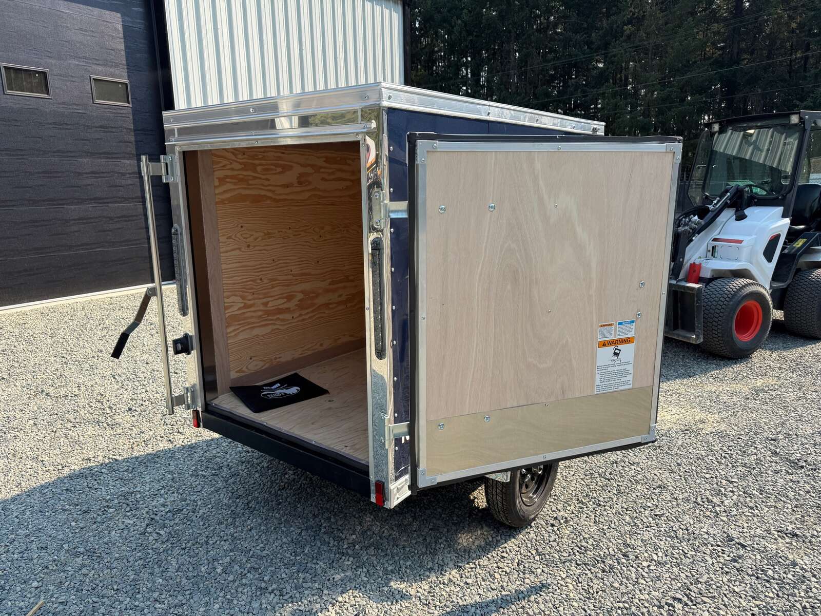 Photo of 2027 CARGO KING 4X6 2,000LB GVW - 50" INTERIOR - BARN DOORS 