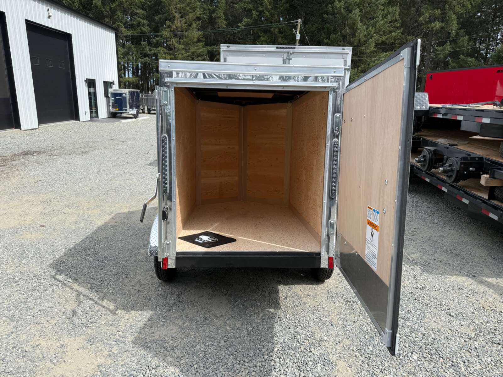 Photo of 2027 CARGO KING 4X6 2,000LB GVW - 50" INTERIOR - BARN DOORS 