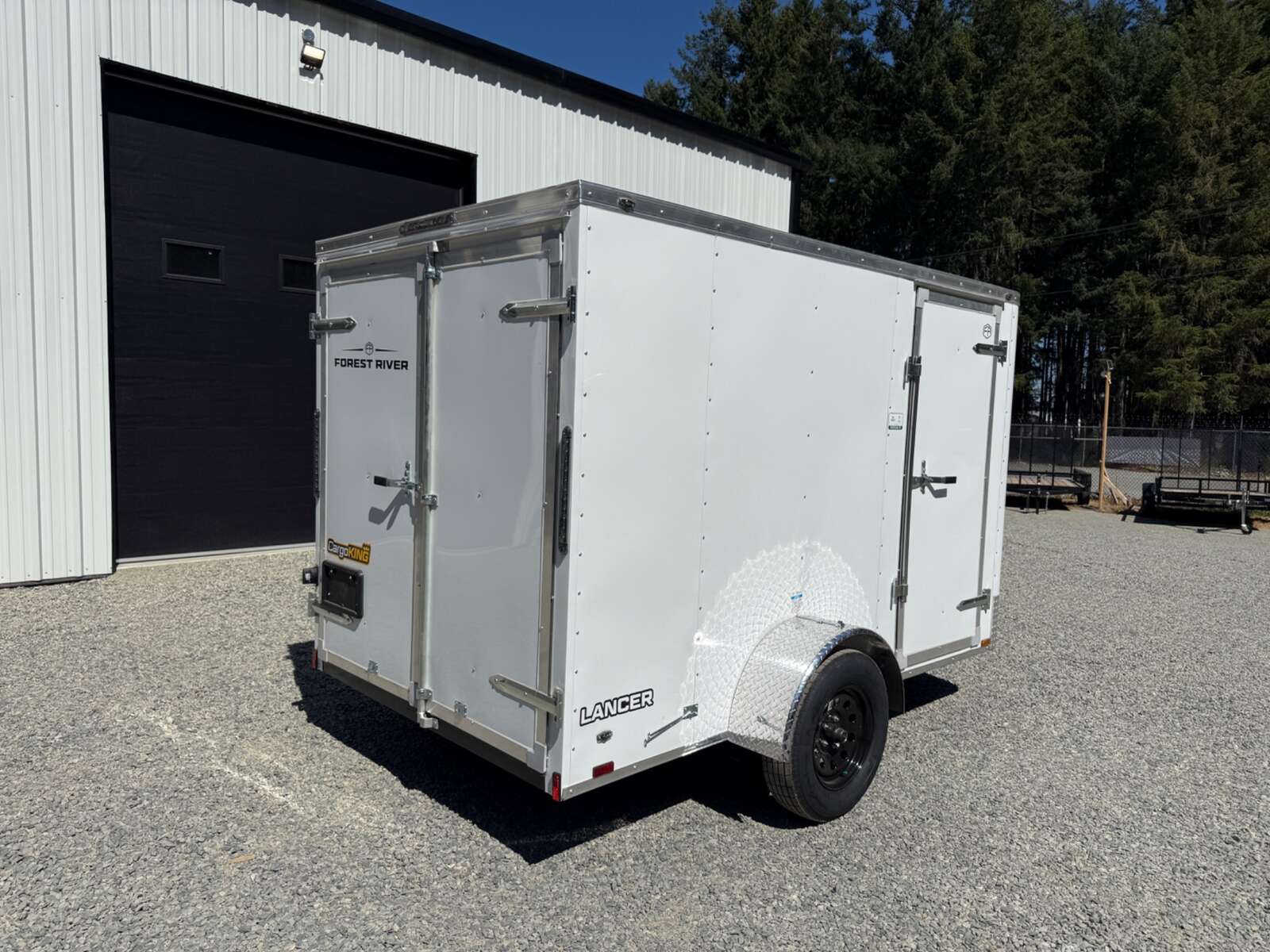 Photo of 2027 CARGO KING 6X10 2,900LB GVW - INTERIOR 71" - BARN DOORS 