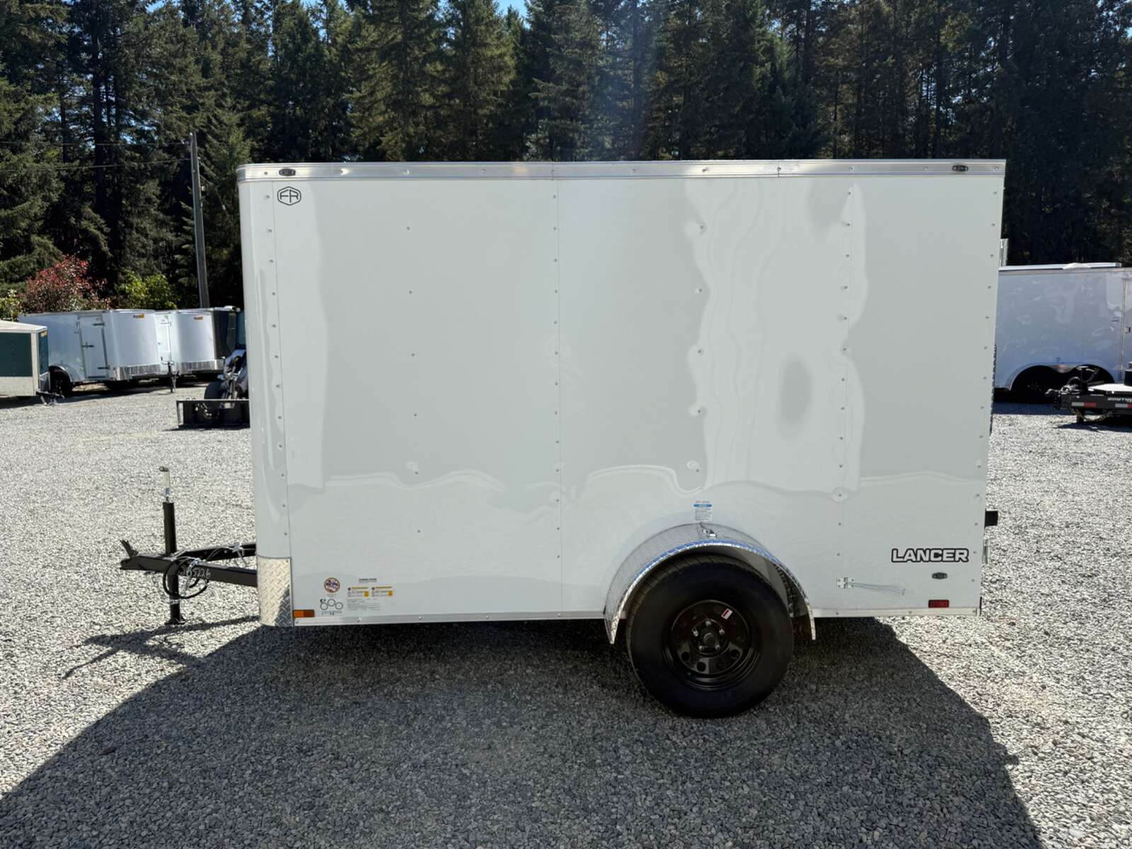 Photo of 2027 CARGO KING 6X10 2,900LB GVW - INTERIOR 71" - BARN DOORS 