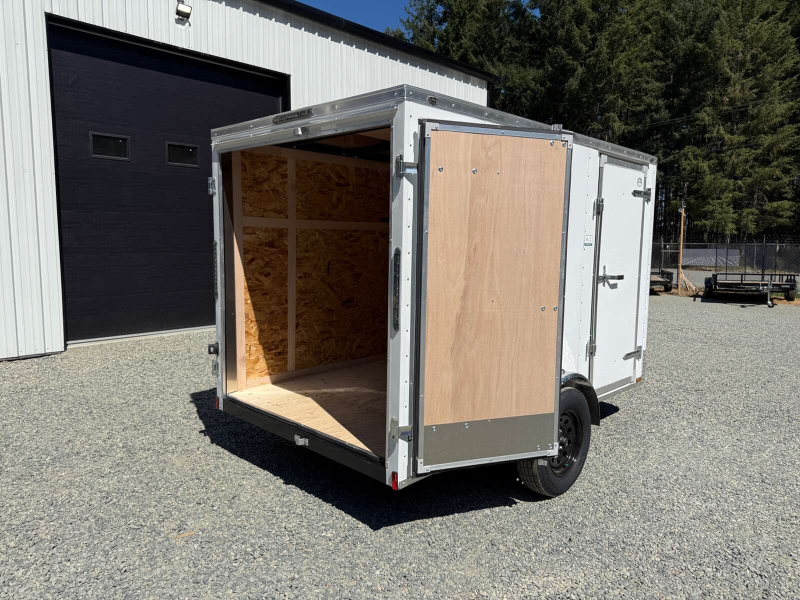 Photo of 2027 CARGO KING 6X10 2,900LB GVW - INTERIOR 71" - BARN DOORS 