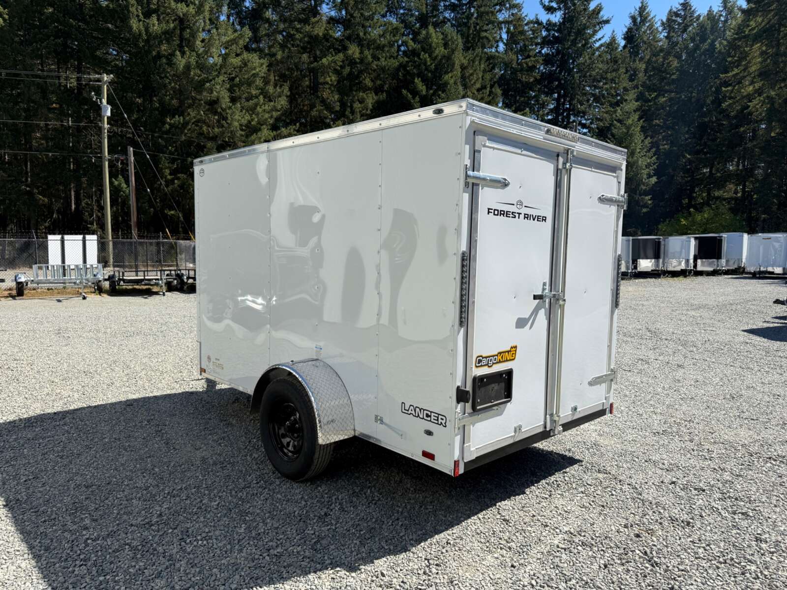 Photo of 2027 CARGO KING 6X10 2,900LB GVW - INTERIOR 71" - BARN DOORS 