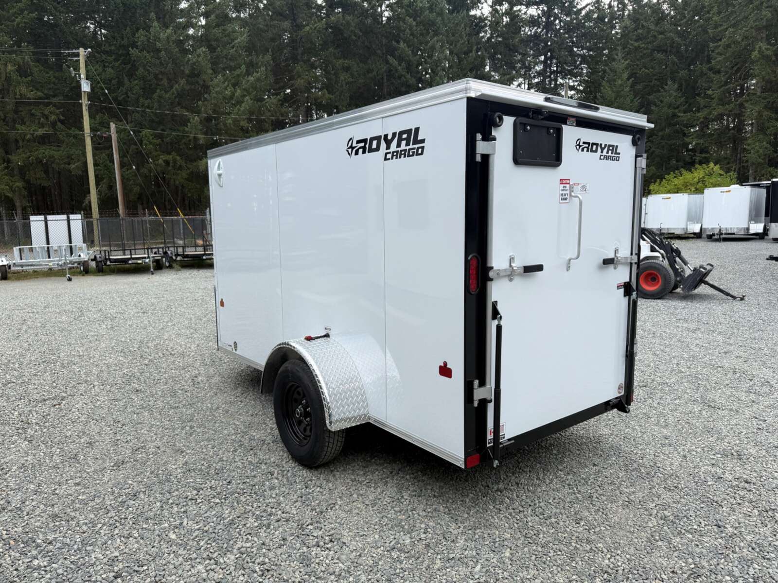 Photo of 2027 Royal Cargo 5X10+V 2990LB GVW - RAMP DOOR - 64" INTERIOR 