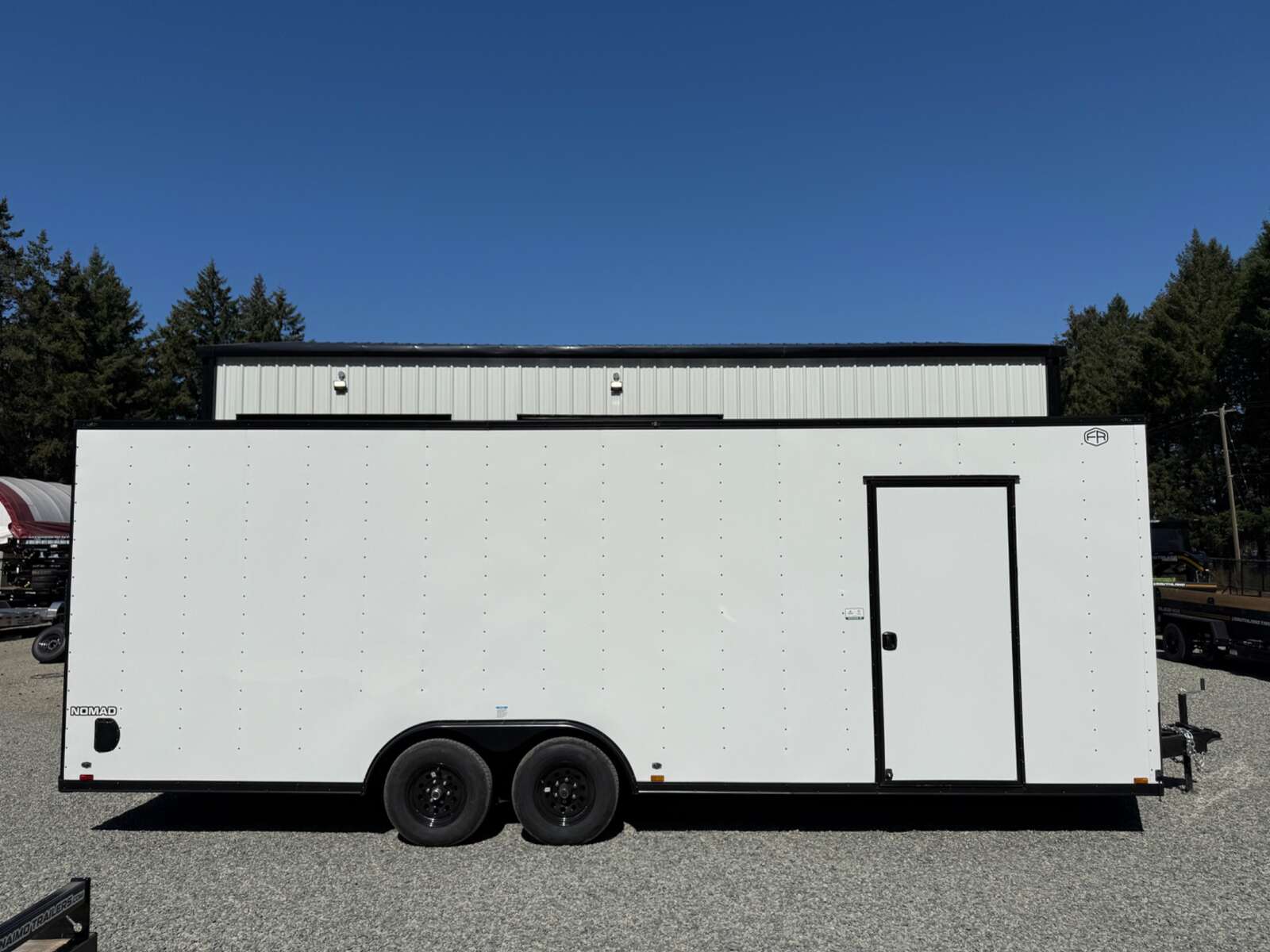 Photo of 2027 Cargo King NOMAD 8.5X24' + V-Nose Car Hauler - 9800LB GVWR - Ramp Door - Blackout Pkg