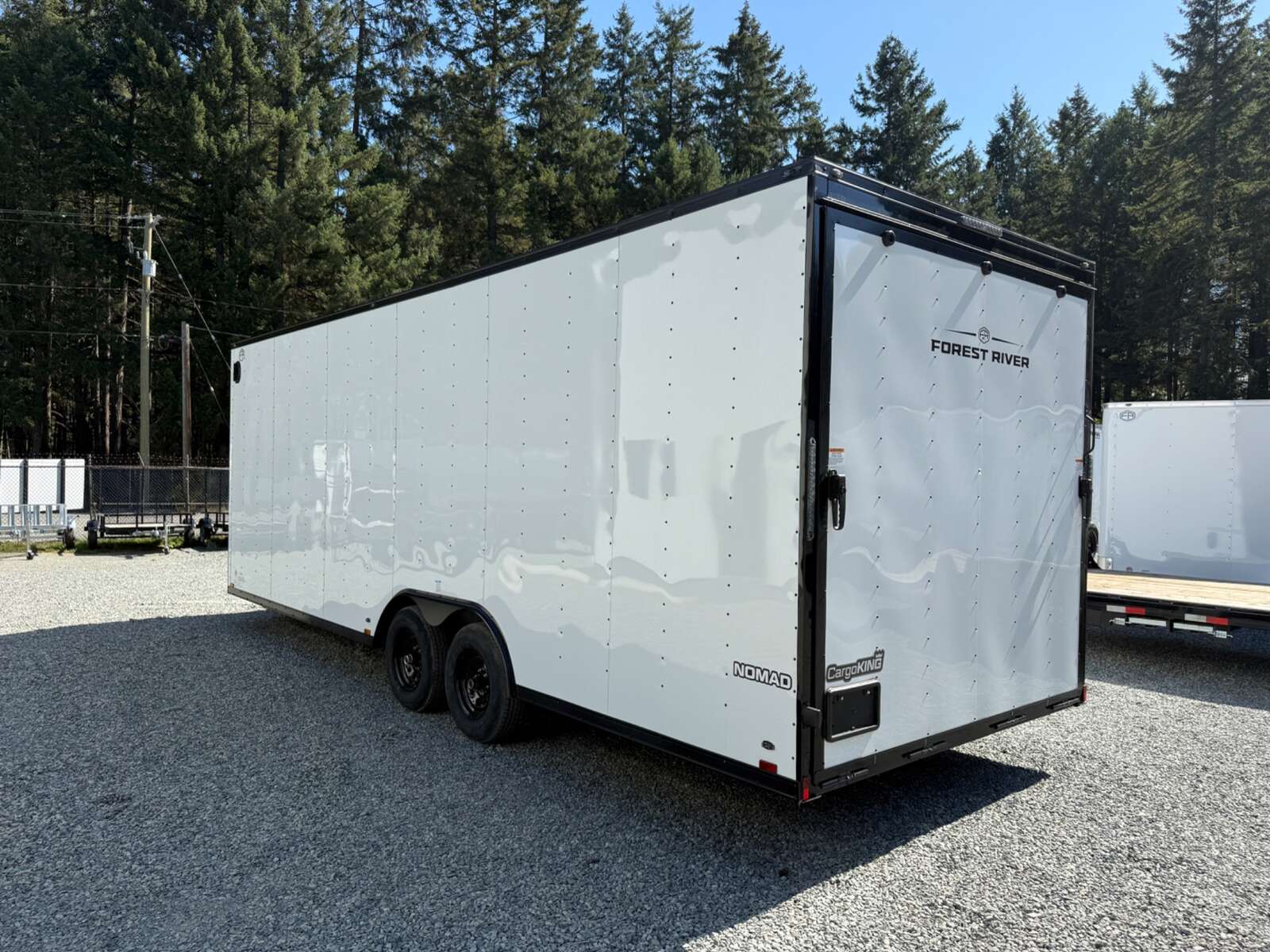 Photo of 2027 Cargo King NOMAD 8.5X24' + V-Nose Car Hauler - 9800LB GVWR - Ramp Door - Blackout Pkg